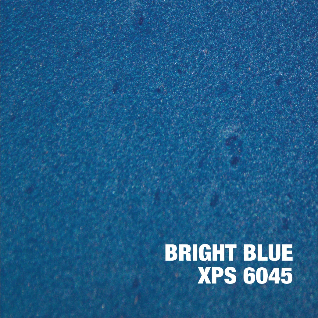 Bright blue epoxy surface with metallic powder speckle finish and reflective sheen
