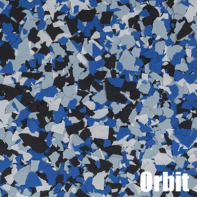 Blue, black, white, and gray epoxy flake flooring with broadcast chip pattern