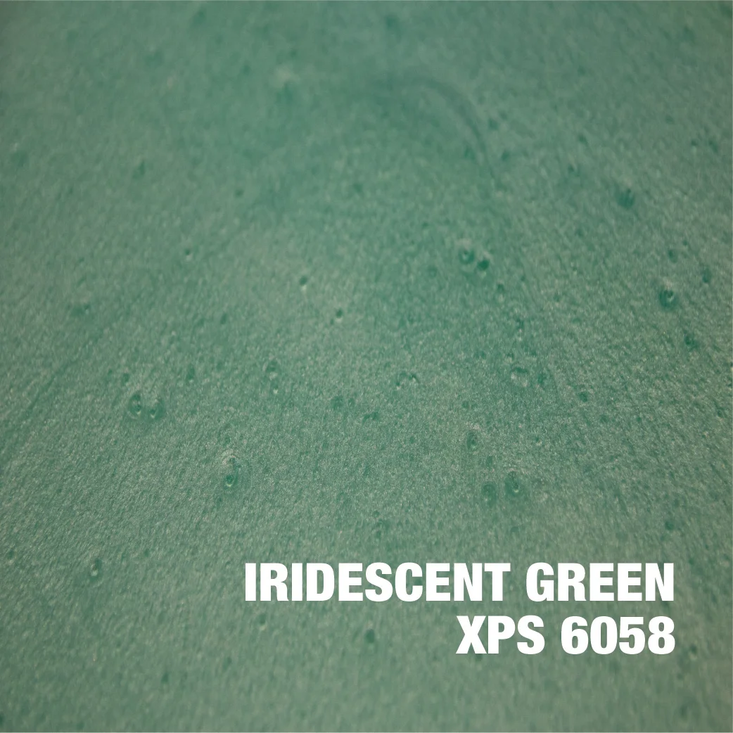 Iridescent green epoxy floor with metallic powder finish and uniform texture