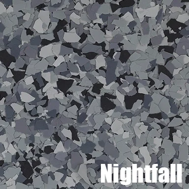 Nightfall epoxy flake flooring with charcoal, gray, and black color chips